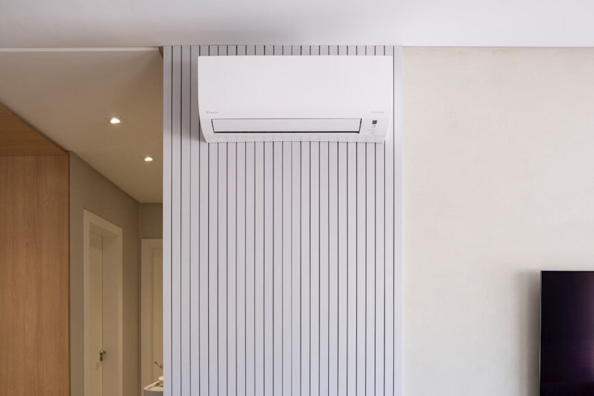 Modern living room with air conditioner and decor